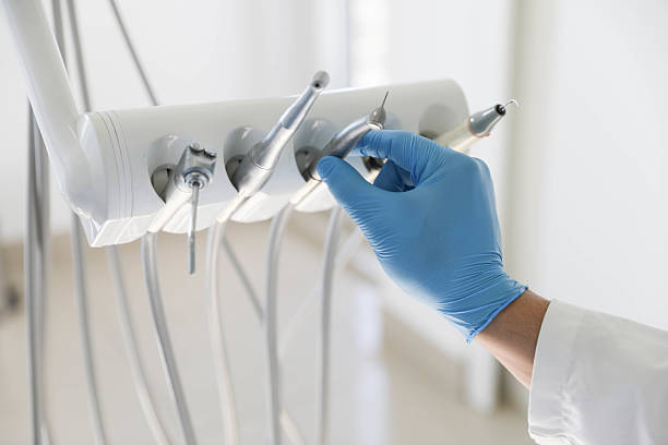 Professional Tooth Extraction technician working in White Knoll, SC